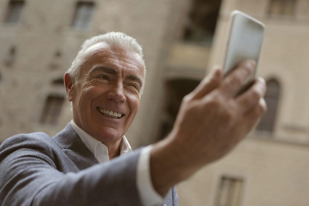 old person taking a photo